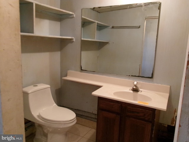 bathroom with tile floors, toilet, and vanity