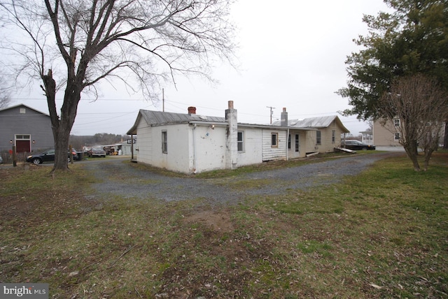 exterior space with a yard