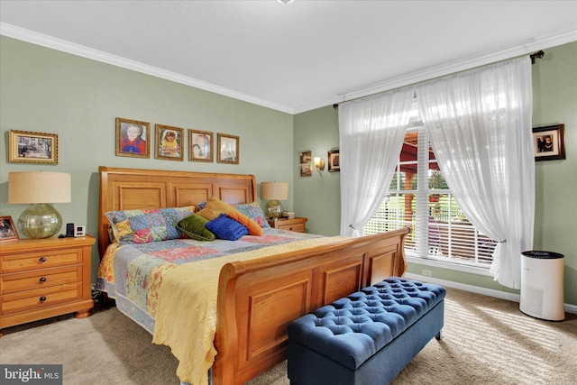 bedroom featuring ornamental molding and light colored carpet