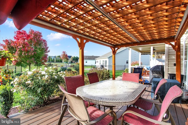 view of patio / terrace with grilling area and a pergola