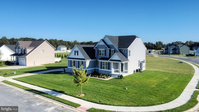 view of front of home featuring a front yard