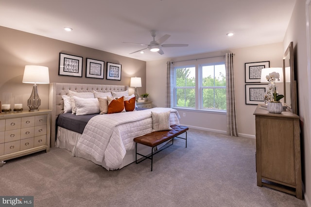 carpeted bedroom featuring ceiling fan