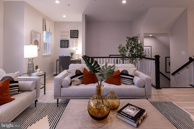 living room with light hardwood / wood-style floors