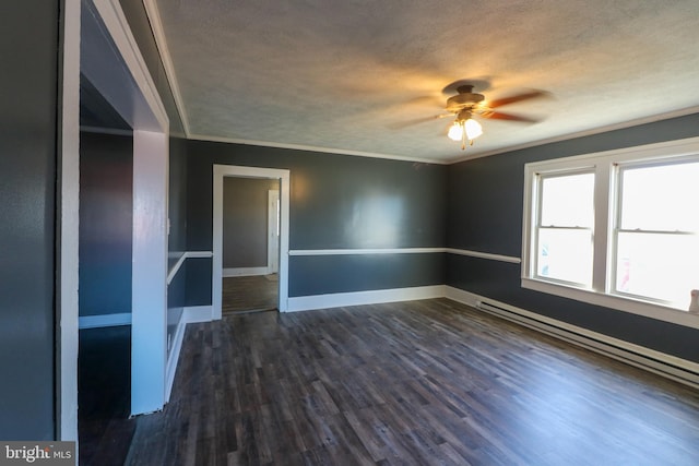 unfurnished room featuring ceiling fan, a textured ceiling, baseboard heating, dark hardwood / wood-style flooring, and ornamental molding