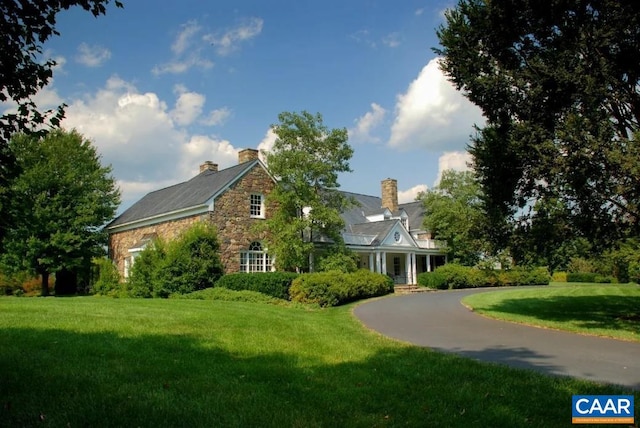 view of front of house with a front lawn