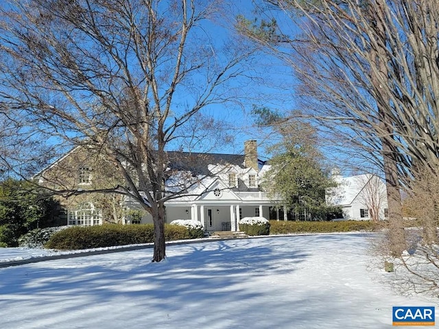 cape cod house with a porch