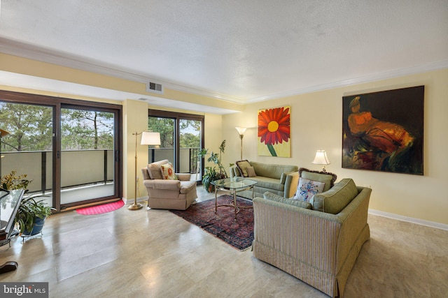 living room featuring a textured ceiling and ornamental molding