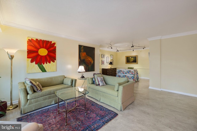 living room with track lighting and crown molding