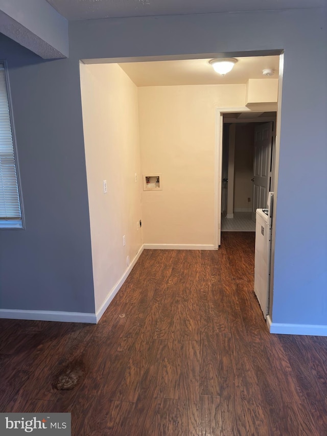 empty room with dark hardwood / wood-style floors