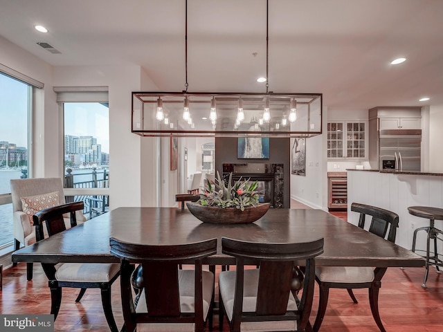dining room with hardwood / wood-style flooring