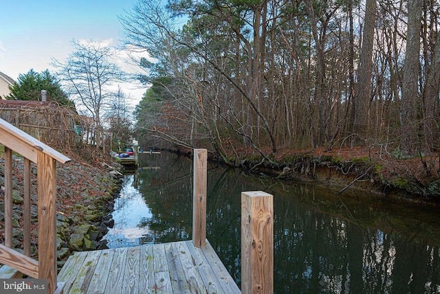 view of dock with a water view