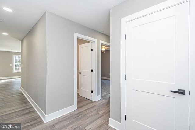 hall with light wood-type flooring