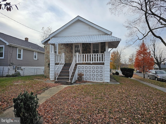 bungalow-style home with a porch