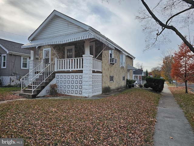 view of front of home featuring covered porch