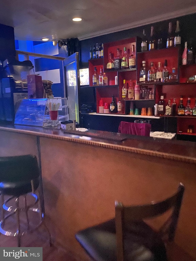 bar featuring ornamental molding