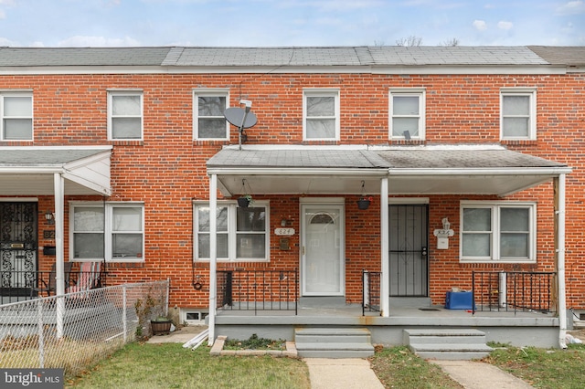 multi unit property featuring covered porch