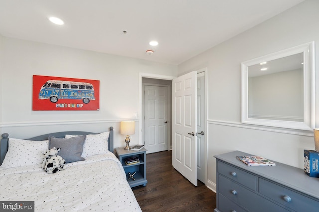 bedroom featuring dark wood-type flooring