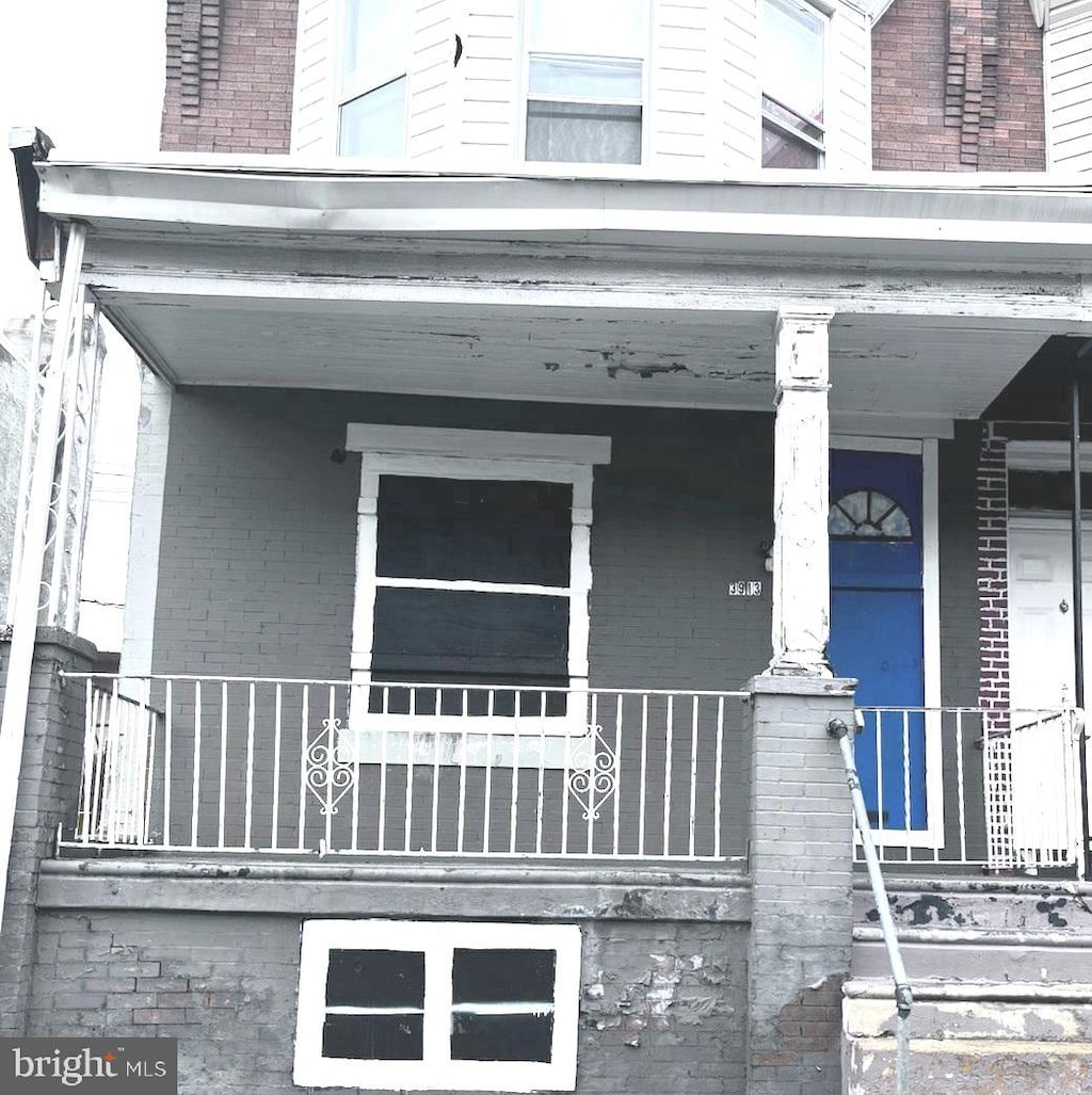 view of home's exterior with covered porch