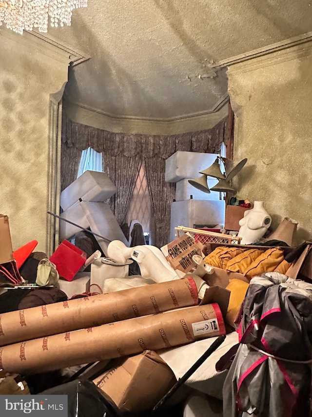 miscellaneous room with a textured ceiling