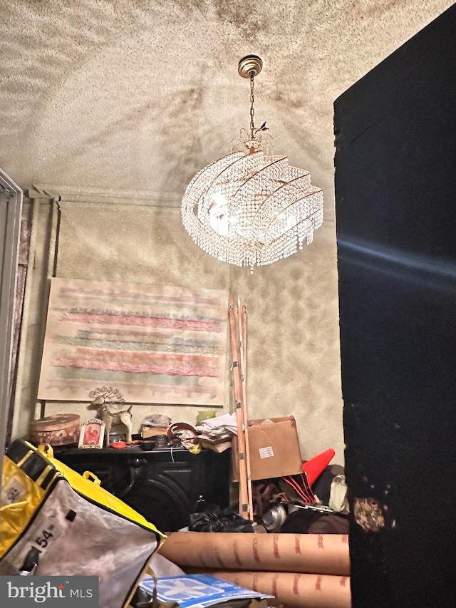 miscellaneous room featuring a textured ceiling