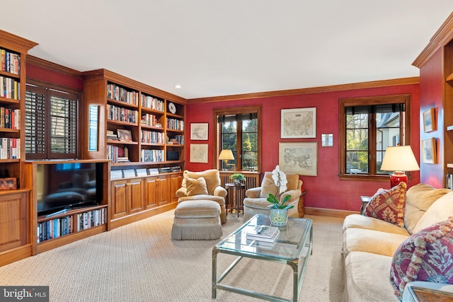 living room with built in features, light carpet, and crown molding