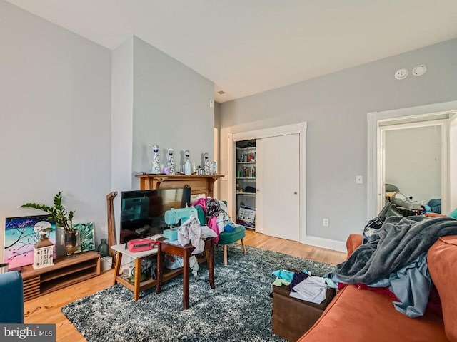 sitting room with hardwood / wood-style floors