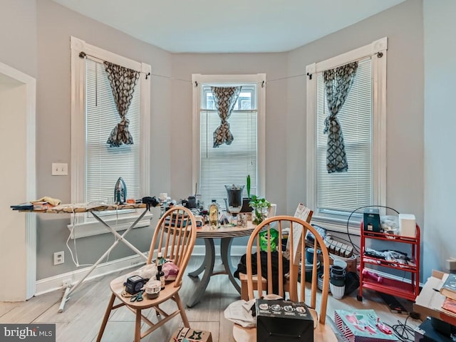 dining space featuring light hardwood / wood-style floors