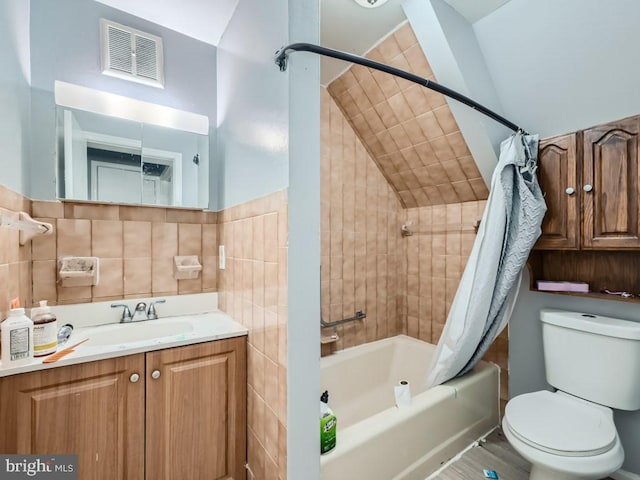 full bathroom with vanity, toilet, and shower / bathtub combination with curtain