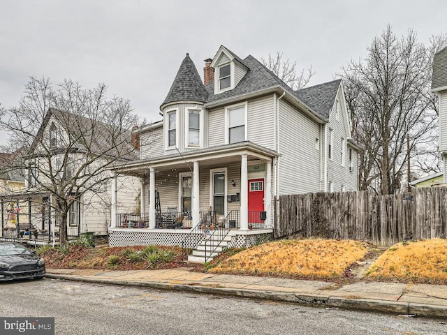 victorian-style house with a porch