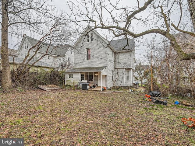 rear view of property with a patio