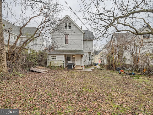 rear view of property with a patio area