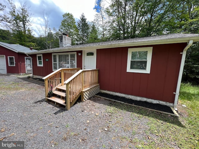 view of front of house with a wooden deck