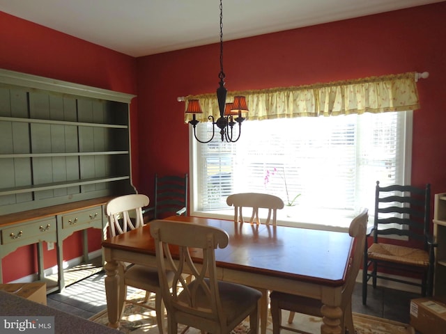 dining room featuring an inviting chandelier