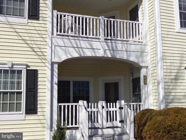 doorway to property with a balcony