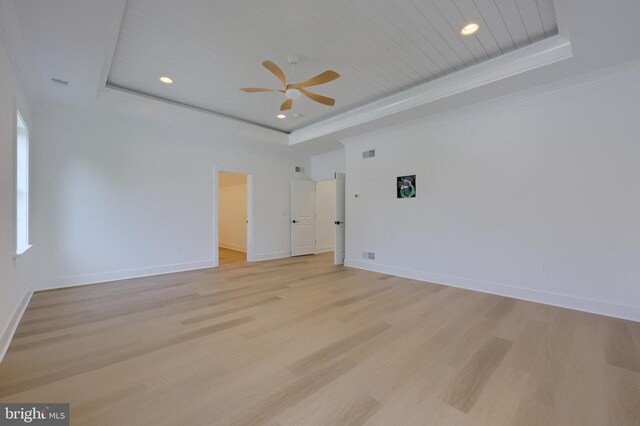 5824 Wild Lilac Dr, Lot East Petersburg, PA 17520 - spare room featuring baseboards, light wood-style flooring, a ceiling fan, and a raised ceiling