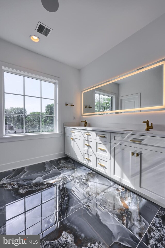 5824 Wild Lilac Dr, Lot East Petersburg, PA 17520 - bathroom featuring marble finish floor, visible vents, a healthy amount of sunlight, and double vanity
