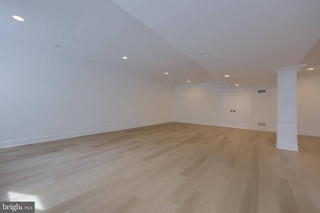 5824 Wild Lilac Dr, Lot East Petersburg, PA 17520 - spare room featuring light wood-style flooring, baseboards, visible vents, recessed lighting, and ornate columns