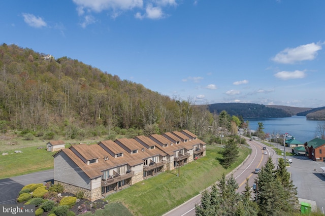 drone / aerial view with a water view