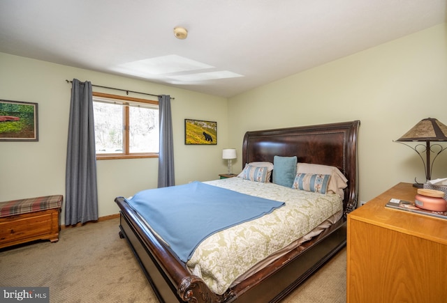 bedroom featuring light colored carpet