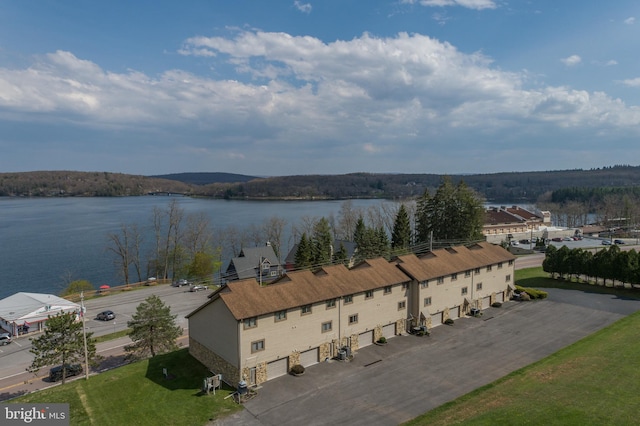 bird's eye view with a water view