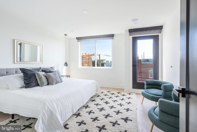 bedroom with light hardwood / wood-style flooring