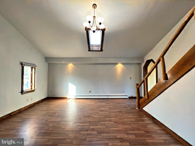 unfurnished living room featuring dark hardwood / wood-style flooring, an inviting chandelier, and a baseboard heating unit