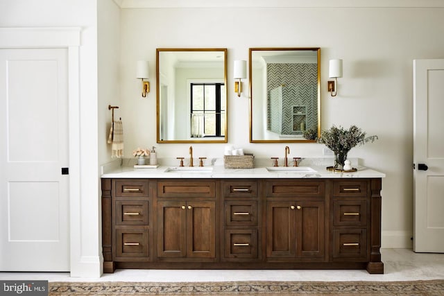 bathroom featuring double sink vanity and tile flooring