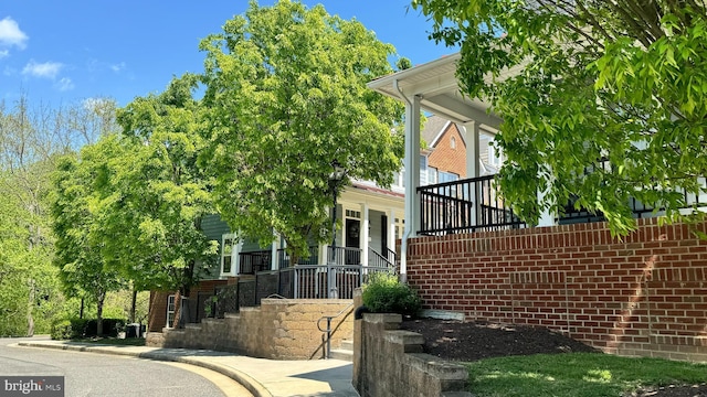 view of home's exterior featuring a porch