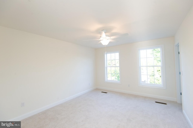 300 Dixon St Unit 202, Easton, MD 21601 - spare room featuring ceiling fan and light colored carpet