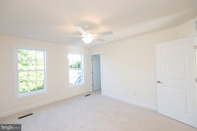300 Dixon St Unit 202, Easton, MD 21601 - empty room featuring light carpet and a ceiling fan