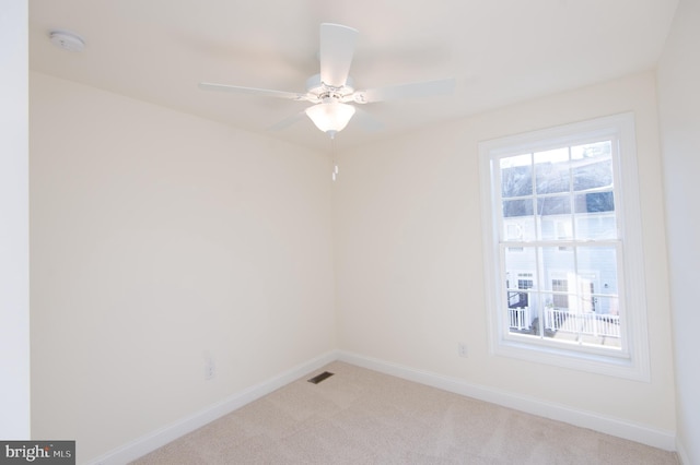 300 Dixon St Unit 202, Easton, MD 21601 - unfurnished room with a smoke detector, light colored carpet, and a ceiling fan