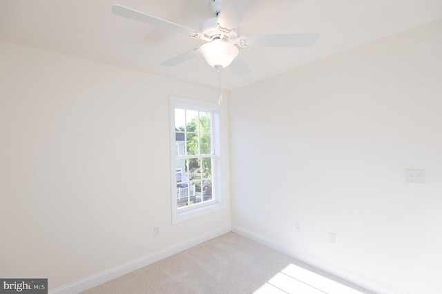 300 Dixon St Unit 202, Easton, MD 21601 - empty room featuring light carpet and ceiling fan