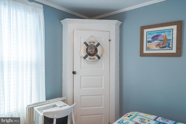 bedroom featuring ornamental molding