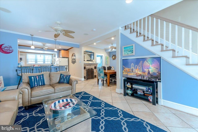 tiled living room featuring ornamental molding